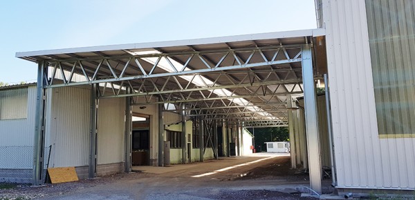 SK0288_01-export-800-600×290 DEK Trenčín - oceľové prestrešenie dvora - montované haly LLENTAB